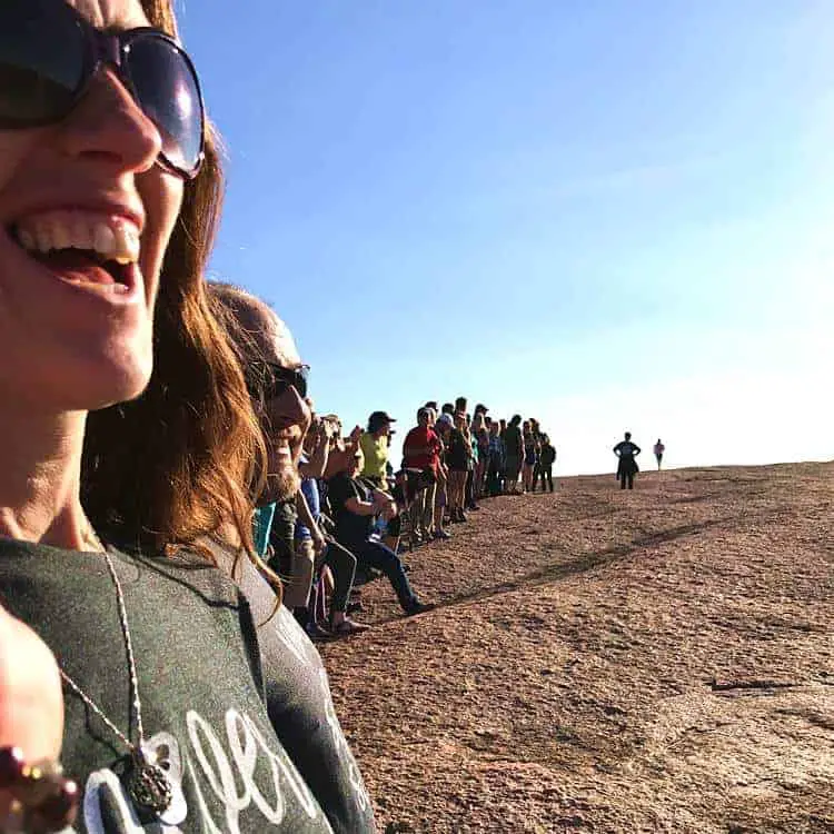 April Pishna of Living a Stout Life on Enchanted Rock with our RVE Summit 2018 Tribe