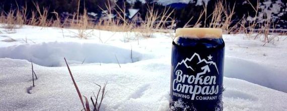 Broken Compass Brewing Glass in the Snow
