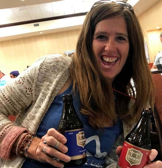 April holding two bottles of Chimay at the BeerNow conference in Great Falls Montana