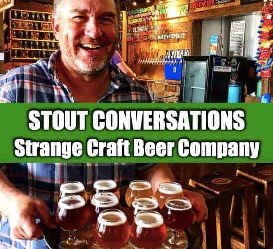 Tim Myers from Strange Craft with Strange Brews holding beer on a tray