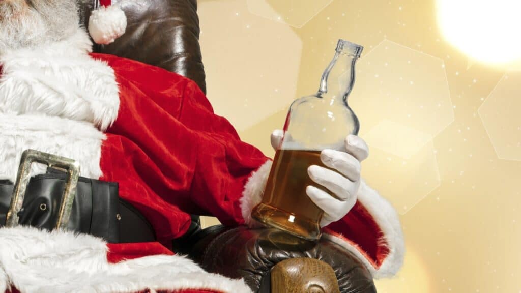 Santa holding beer bottle for a craft beer gift for Christmas