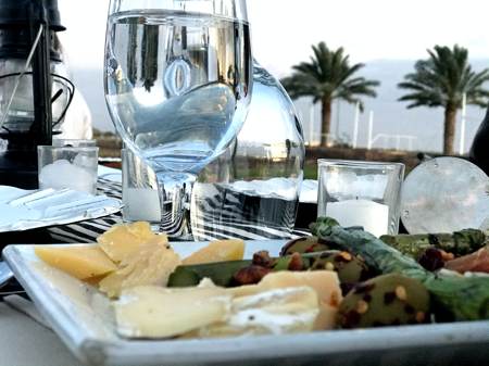 cheese and bread plate with glassware for sunset dinner yuma arizona