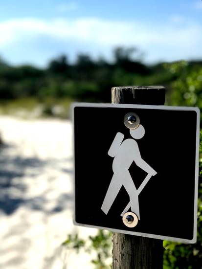 hiking sign on beach in Alabama