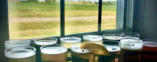 flight of Kinkaider beer at the window of farmland Nebraska