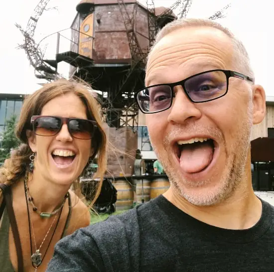Ken and April at Dogfish Head with treehouse in background Delaware