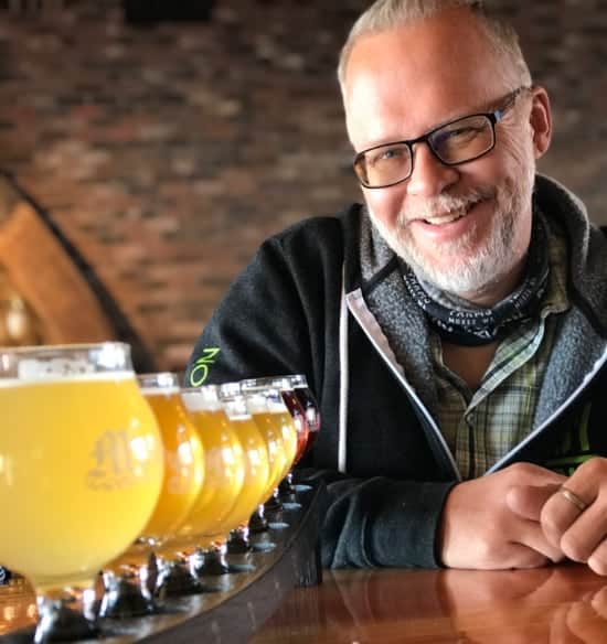 Ken and a flight of beer at Monkless Belgian Brewing in Bend Oregon