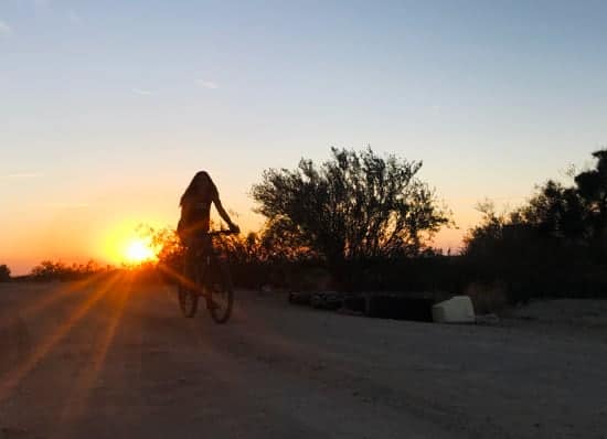 April-riding-bike-at-sunset-Slab-City-CaliforniaIMG_4928-copy