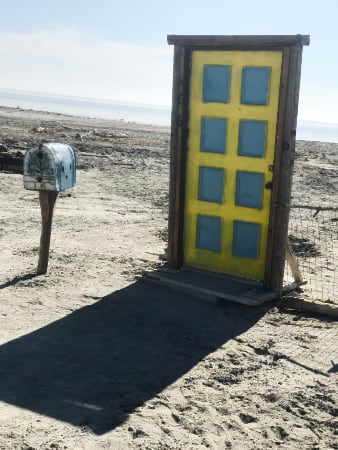 yellow door and mailbox on beach Salton Sea CaliforniaIMG_3436 copy