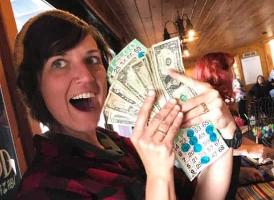 Brittain with money playing Bingo at Sitting Duck Flathead Valley Montana copy