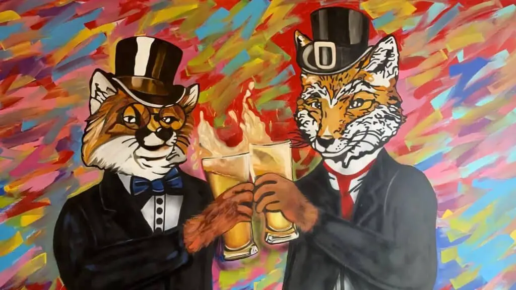 two foxes with beer at Gallant Fox Brewing Kentucky copy