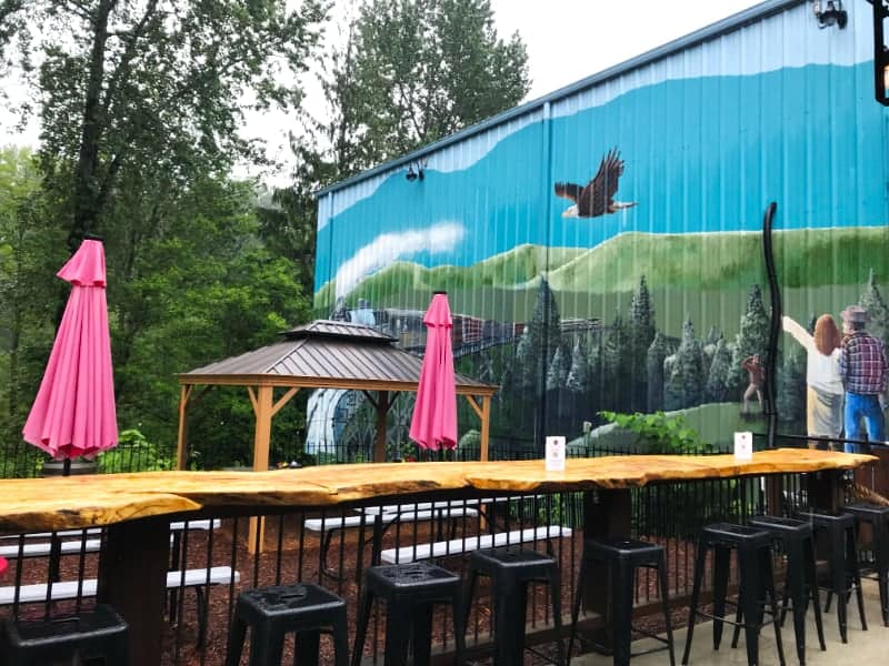Snoqualmie Falls Brewery patio and mural Snoqualmie brewery tour Washington copy