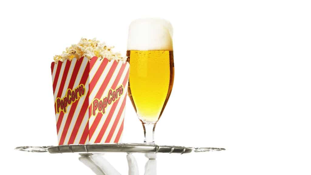 popcorn and beer on a silver tray