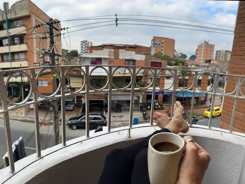 view from apartment in Medellin and coffee cup