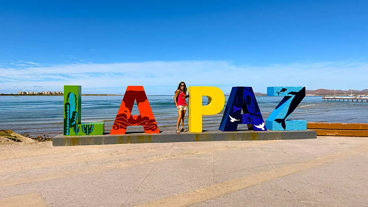 April Pishna & La Paz malecon sign